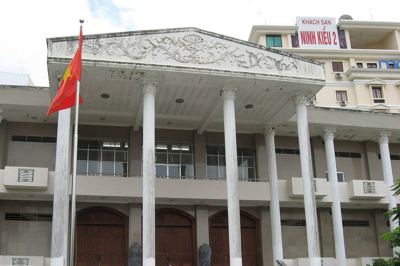 Columned front of the Can Tho Museum on Hoa Binh Avenue