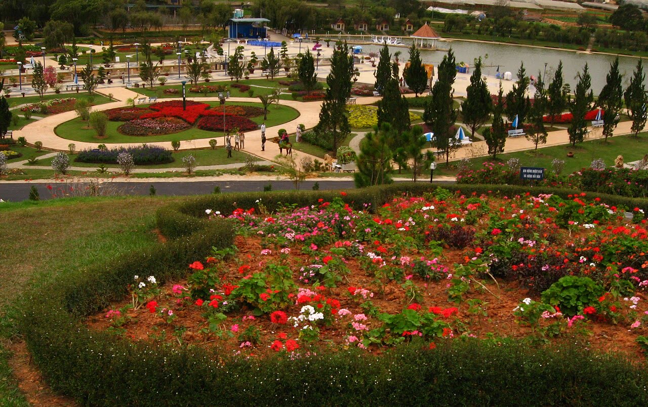 Flower beds and paths in the city garden