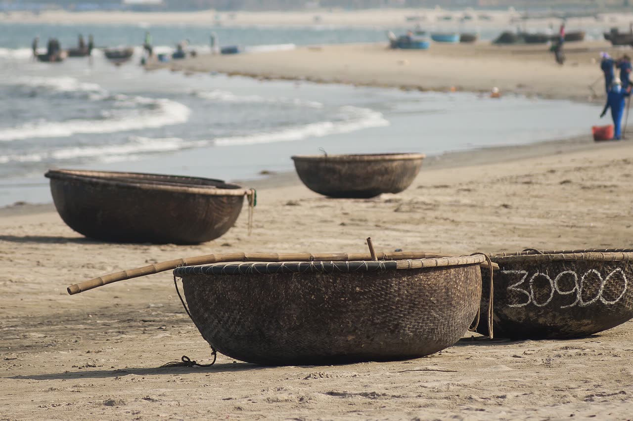 Round basket boats lined up on a Da Nang beach