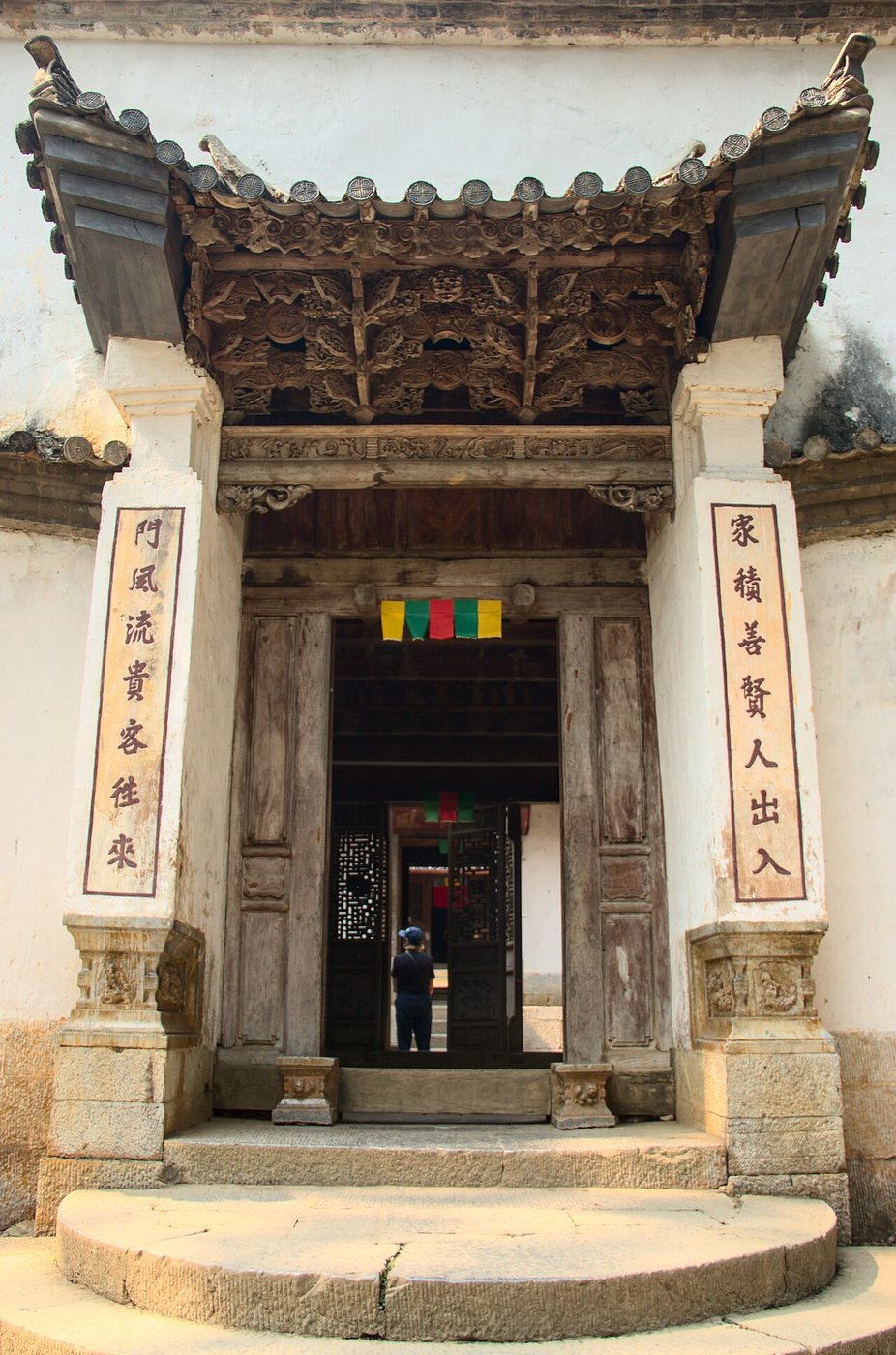 Carved wooden gate of the Vuong family palace at Sa Phin