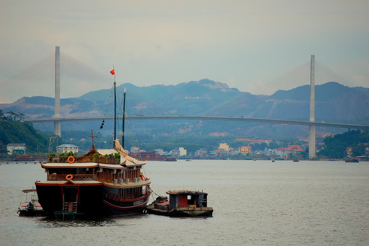 Bai Chay Bridge across the water, both pylons visible