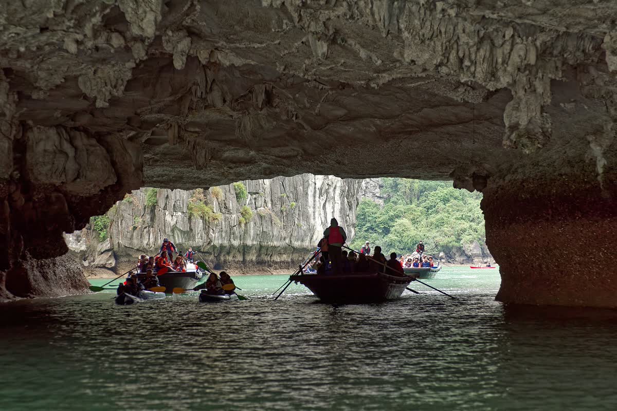 Boats inside Hang Luon Cave in Ha Long Bay