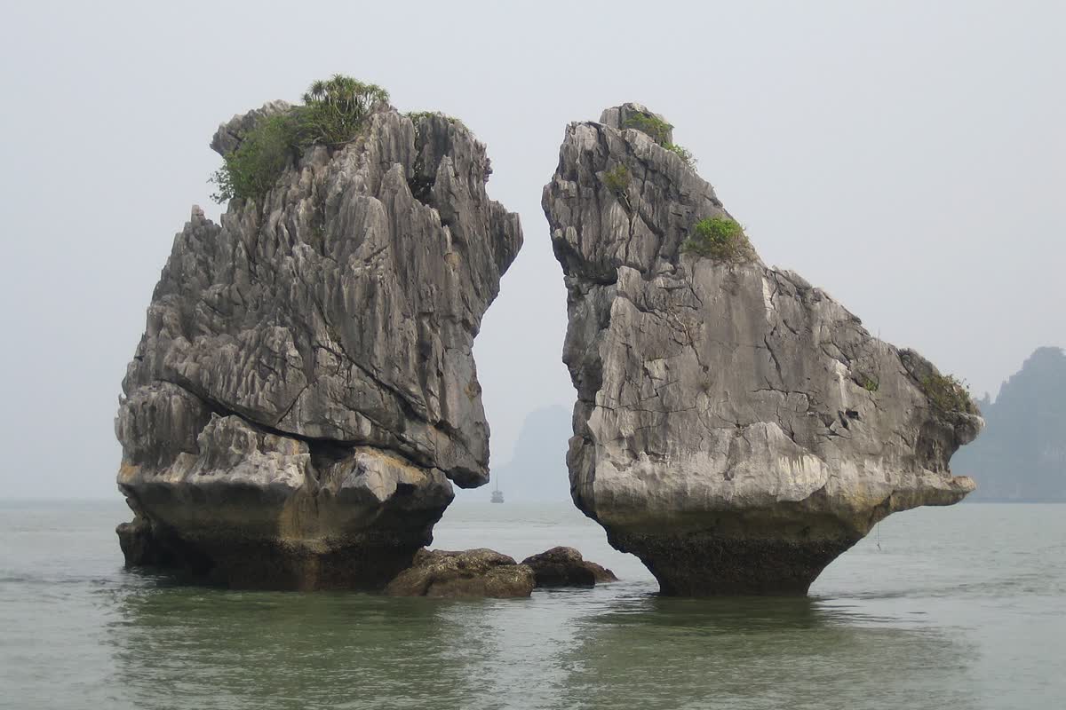 The Fighting Cock rocks, also called the Kissing Rocks, in Ha Long Bay