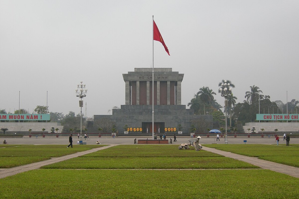 The Ho Chi Minh Mausoleum at the head of Ba Dinh Square, with the national flag and lawns in front