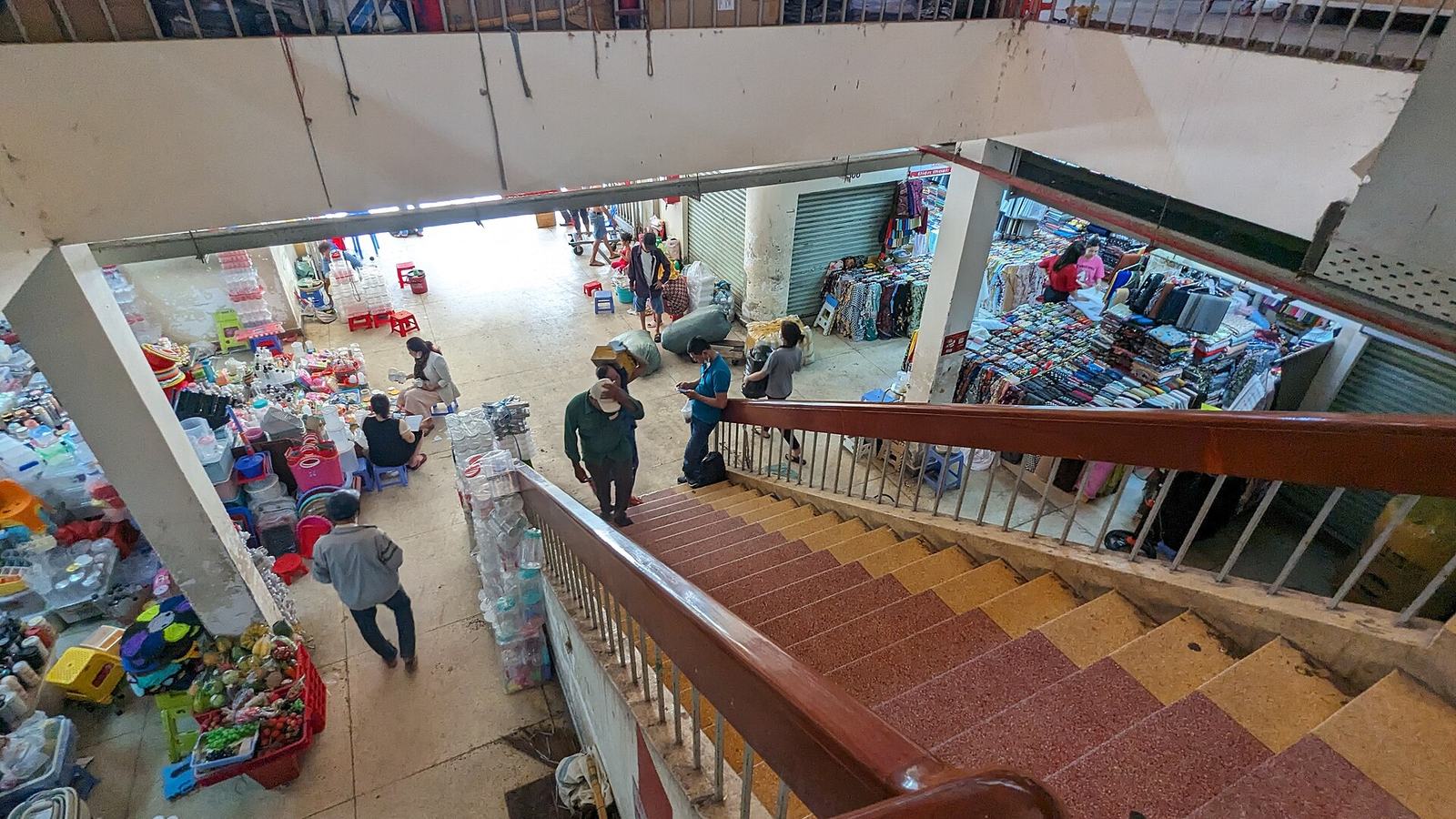 Stairs and wholesale stalls inside Binh Tay Market