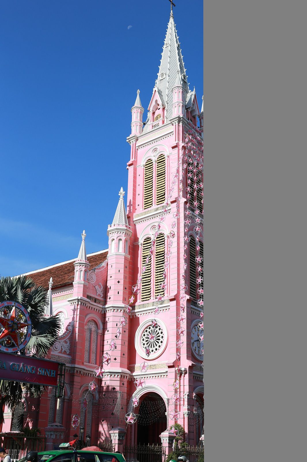 The pink facade and the rose window, from the street