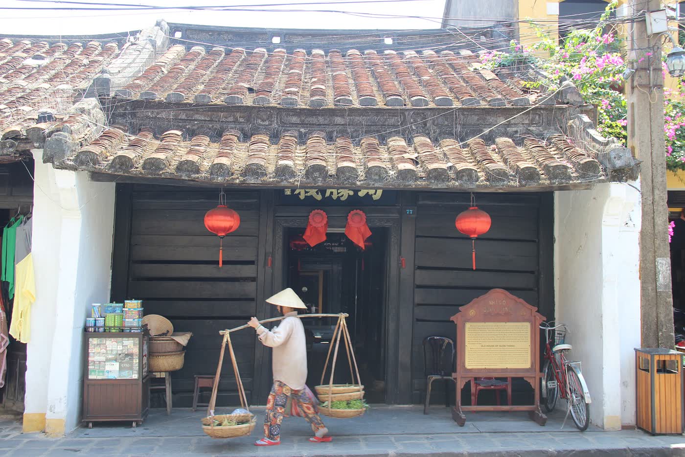 The tiled front of Quan Thang house, lanterns by the door