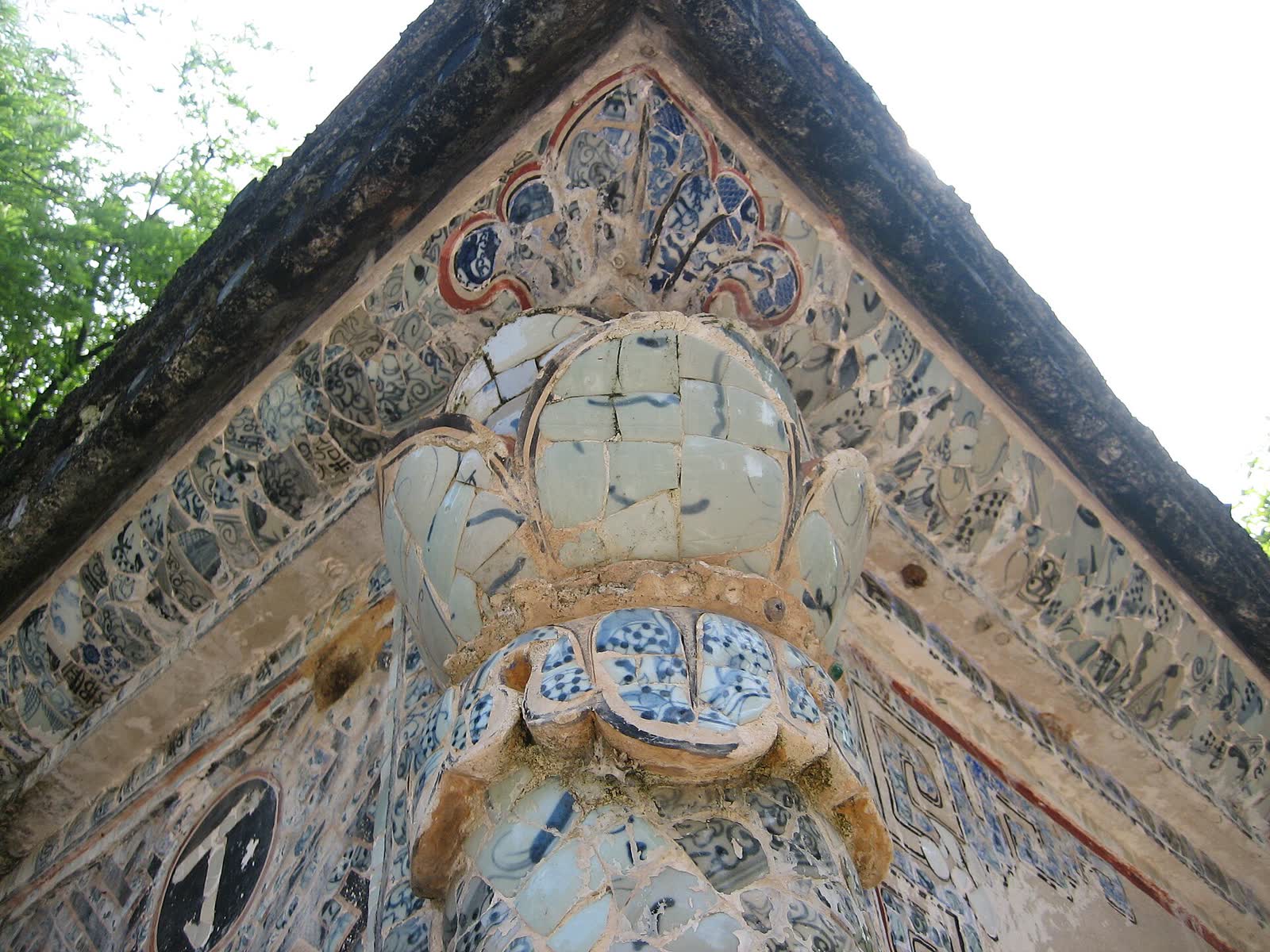 Glazed roof tiles and ridge ornaments at Tu Hieu Pagoda