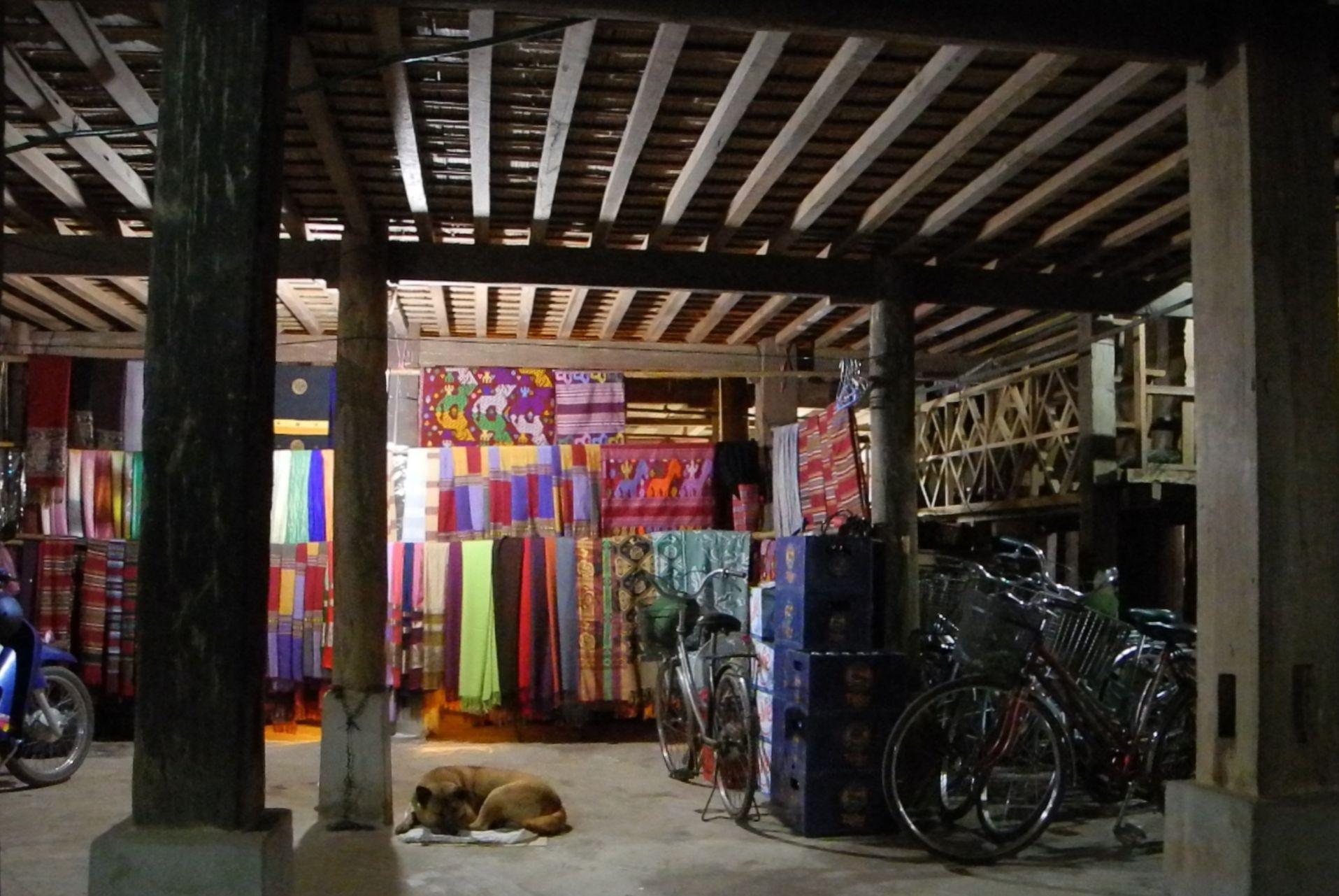 Cloth hung under a stilt house in Pom Coong