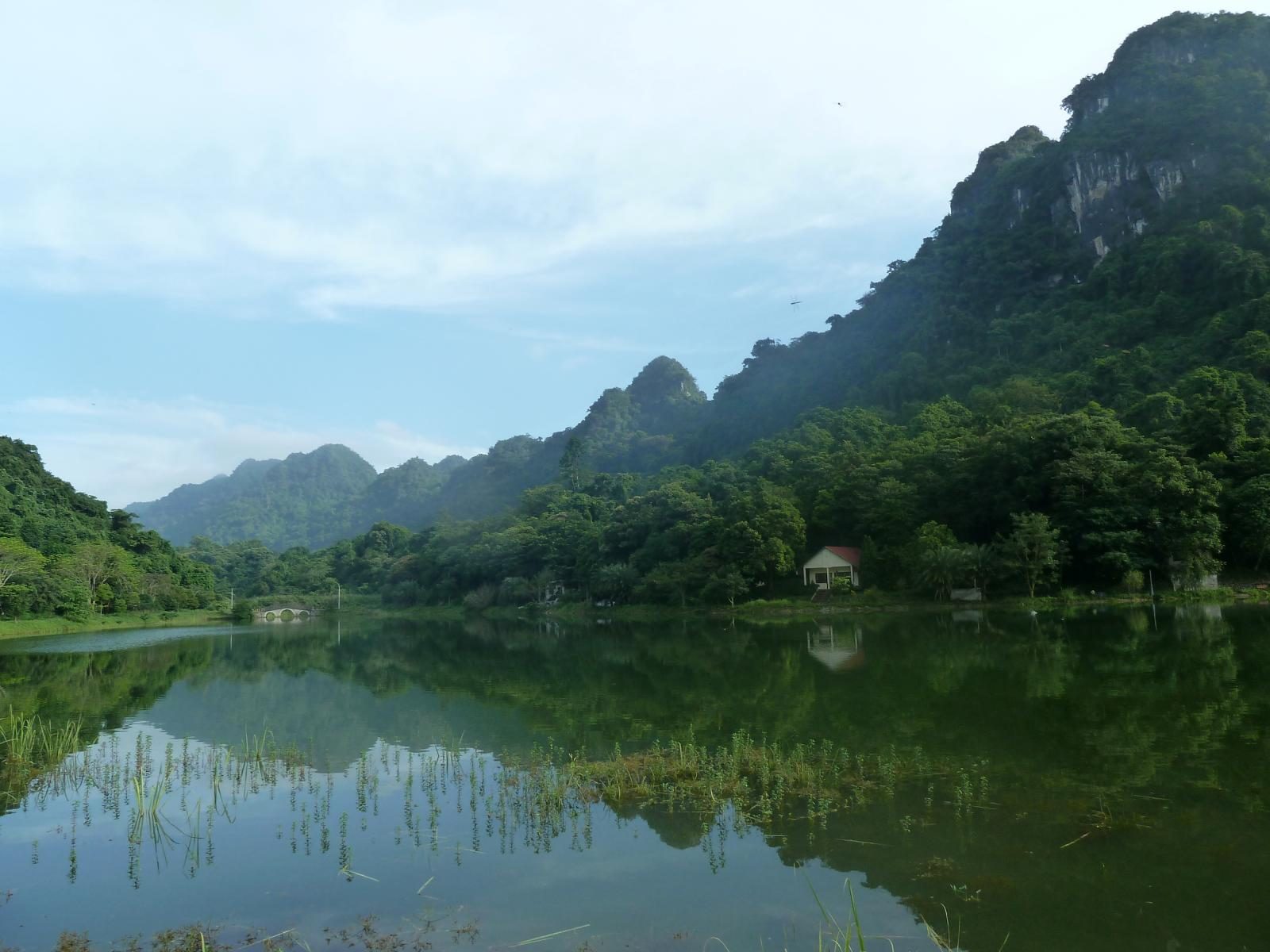 The lake and the limestone ridge at Cuc Phuong