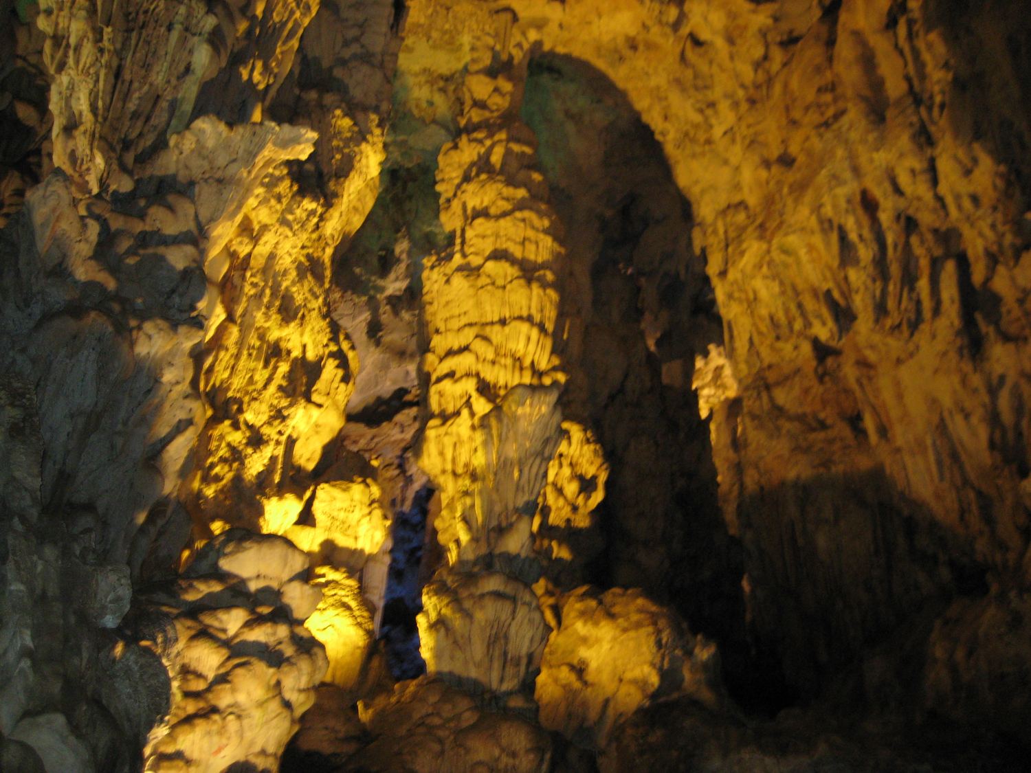 A lit column of flowstone inside Van Trinh