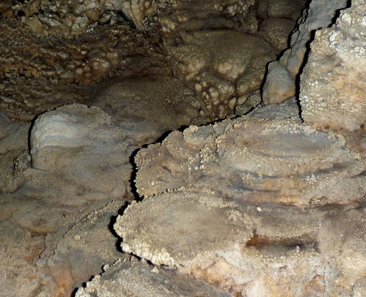 Layered flowstone inside Tien Son Cave