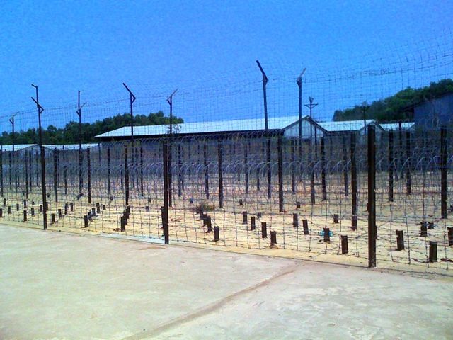 Barbed wire and barracks at Phu Quoc Prison