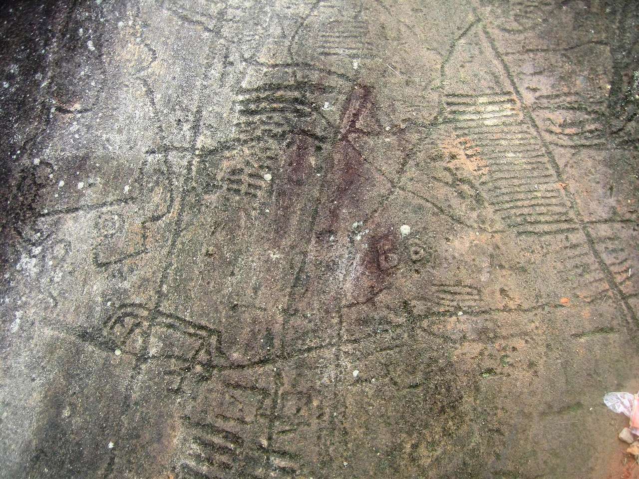 Close view of carved lines on a stone at the Sa Pa field