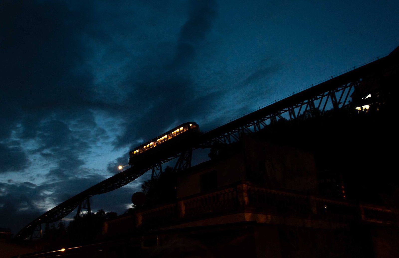 The Muong Hoa train on its viaduct at dusk