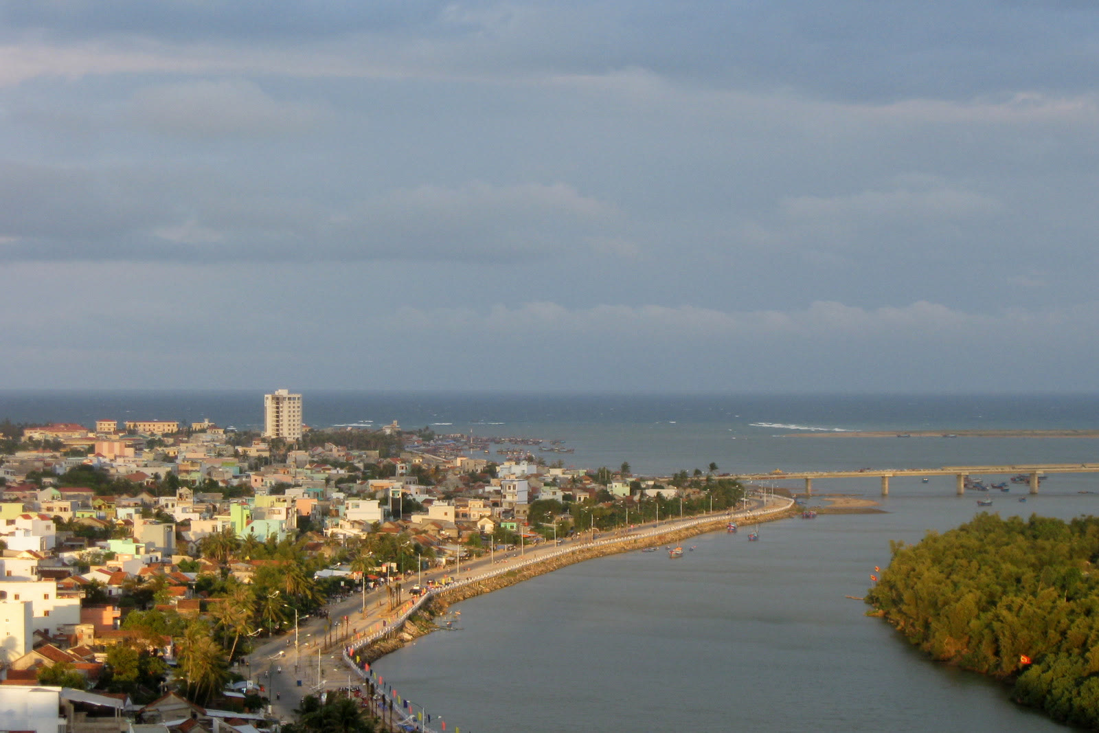 The Da Rang river from the hill in Tuy Hoa, with the town and a bridge toward the sea