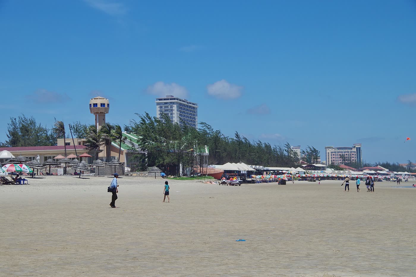 Hotels and beach umbrellas along Back Beach in Vung Tau