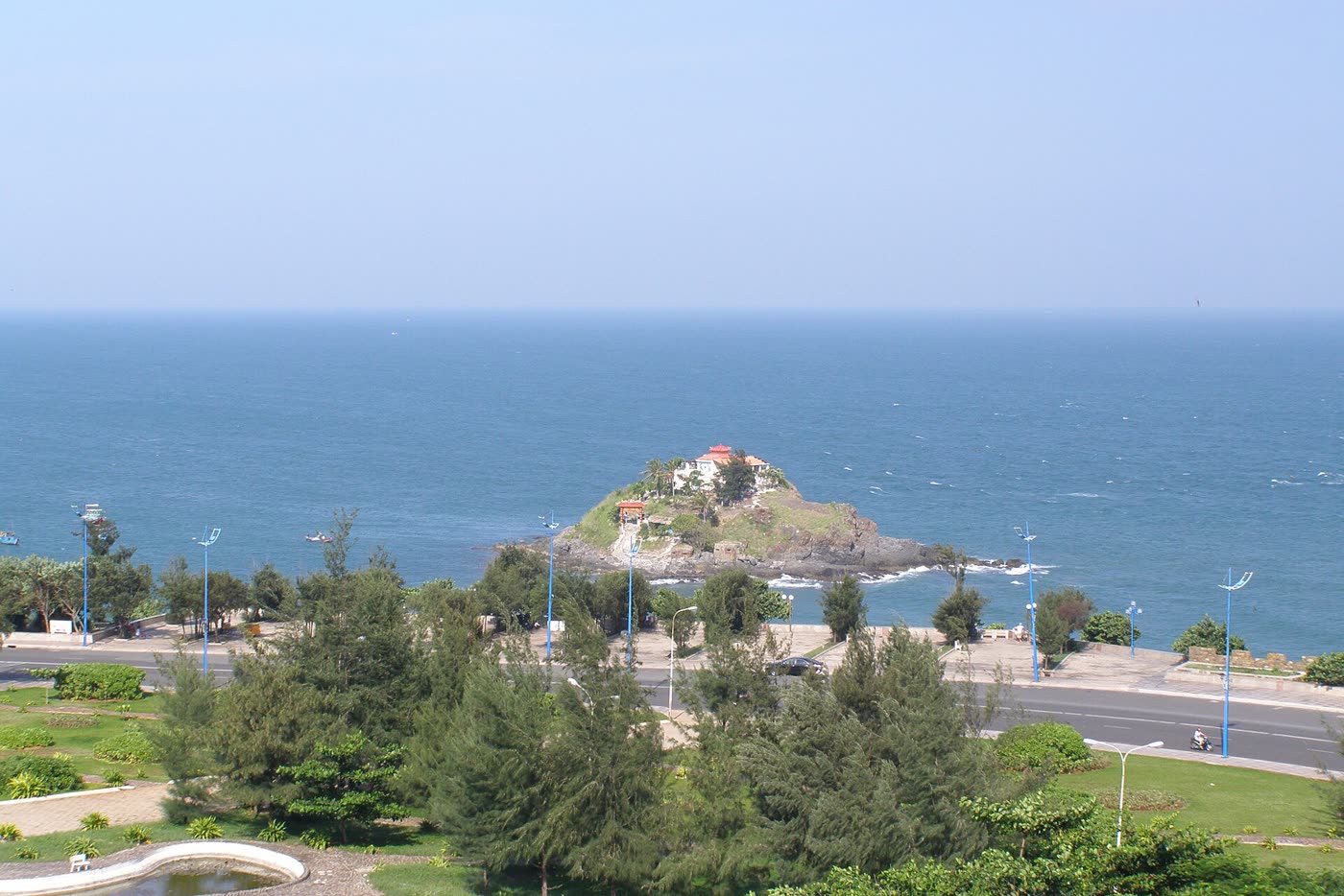 Hon Ba seen from the Back Beach end, shrine roof on the rock